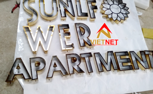 Bảng hiệu chữ inox vàng căn hộ cao cấp Sunflower Apartment